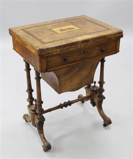 A Victorian walnut games and work table, W.1ft 11in.